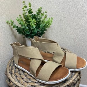 Taupe colored zip up sandals